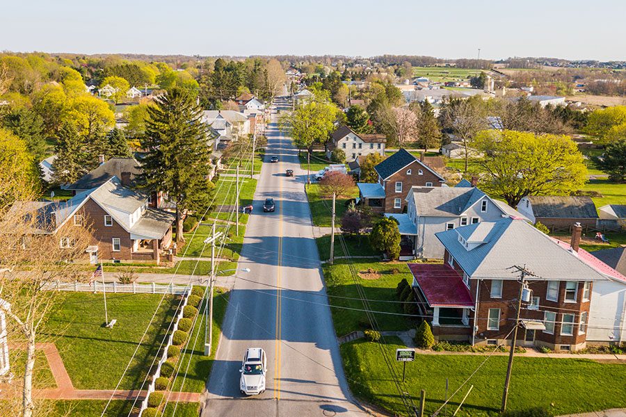 Wapakoneta, OH - Aerial of the Small Town Surrounded by Farmland Displaying One Main Road for the Town